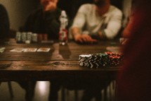 A group of men playing a poker game.