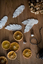 felt feathers and dried orange slices 