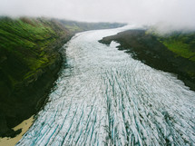 sheets of glacier ice in a frozen river 