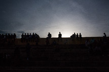 Fans watching a track meet in East Africa