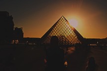 louvre pyramid at sunset 