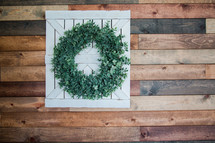 boxwood wreath on a barn door 