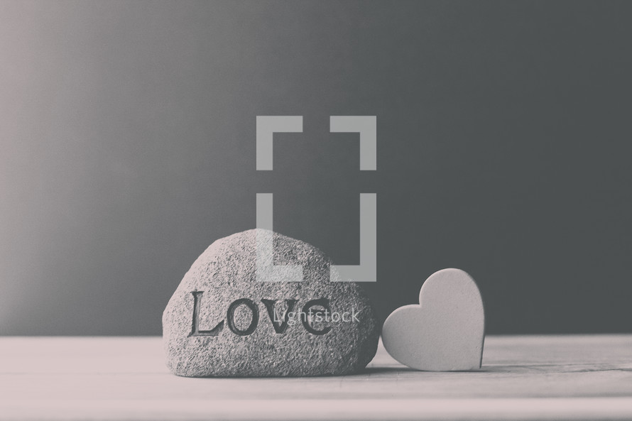 a rock with the word love