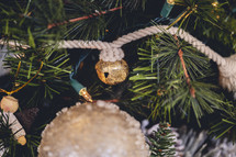 Christmas bell garland on a Christmas tree 