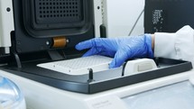 Lab instrument closing before operation in a chemistry laboratory