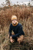 portrait of a man in a field 