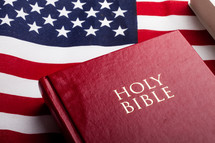 Holy Bible on an American Flag 
