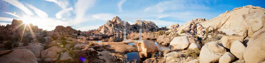 puddle on desert rocks 