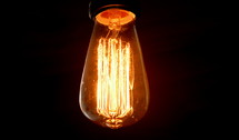 glowing filaments in an Edison lightbulb 