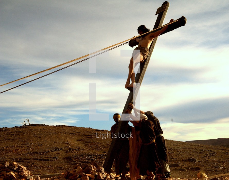 raising the cross at crucifixion 