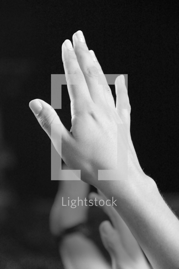 hands raised to God  - outstretched hand