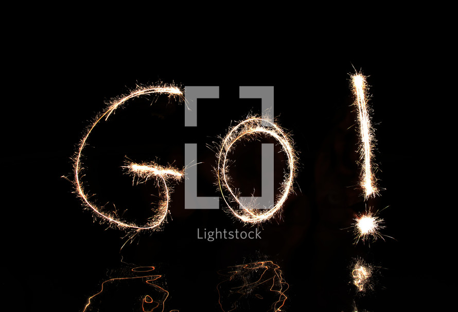 "GO" written in fireworks.