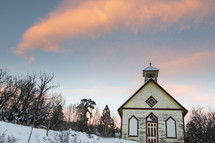 snow and a rural church 