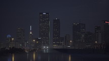 view of city skyscrapers at night 