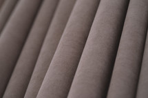 Brown curtain folds close-up