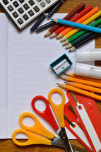Colorful school supplies  on a desk
