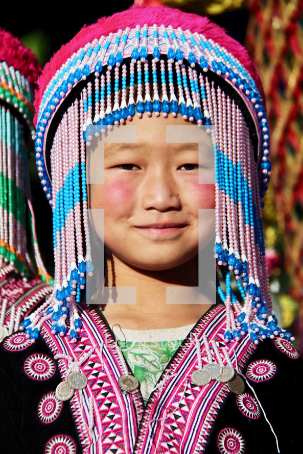 child in traditional headdress 