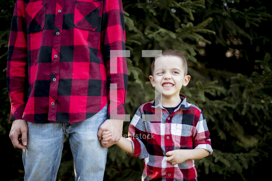 father and son in flannel shirts 