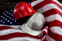 helmets on an American flag 