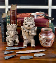 artifacts and collectibles on a wooden table