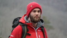 a man backpacking on a trail 