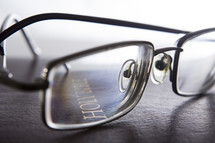 reading glasses on a Bible