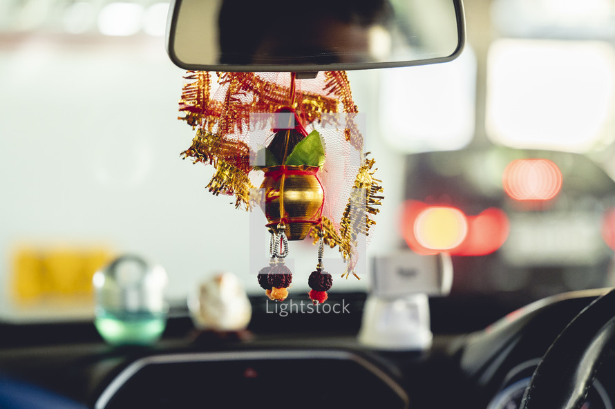 Hindu god in the vehicle of a taxi in India