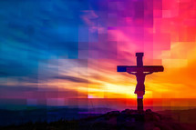 The cross at sunset silhouetted against a colorful background
