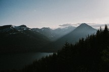 mountains surrounding a lake 