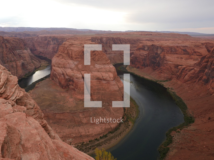 The Colorado River running through iconic Horseshoe Bend