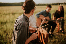 musicians practicing in a field 