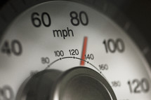 Speed gauge on a car.