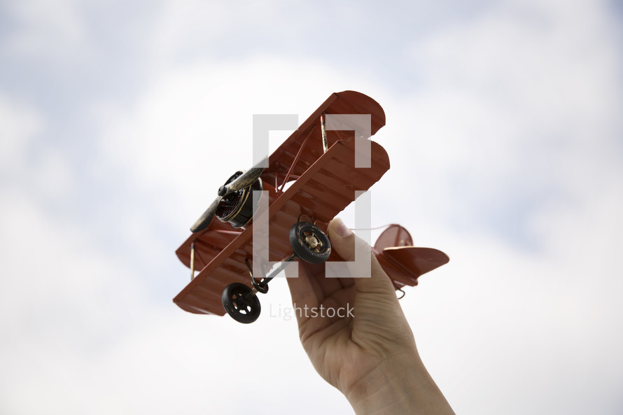flying a toy airplane 