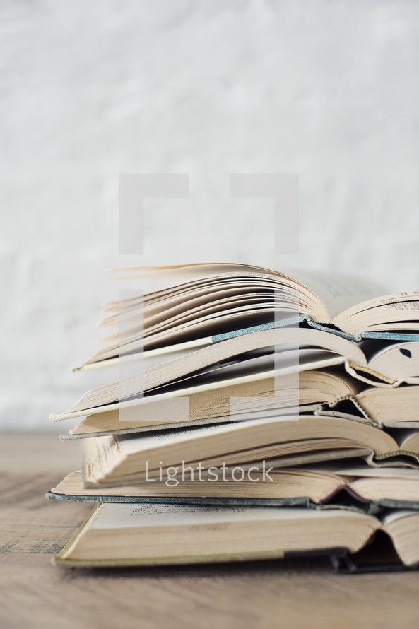 open books stacked in a pile