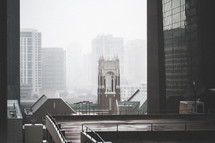 roof tops in a foggy city 