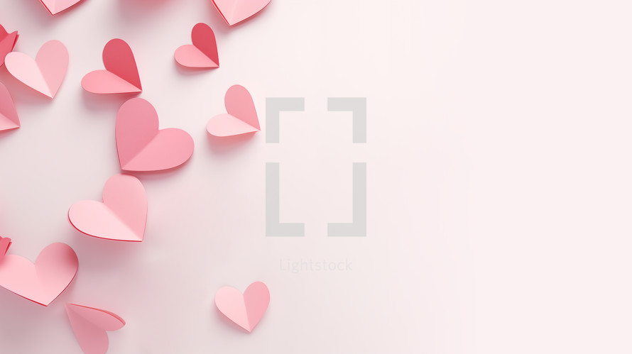 Pink background with pink paper hearts. 