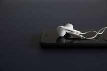 earbuds on an iPhone 
