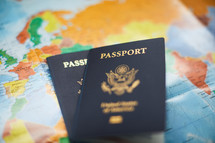  passports on a world map 