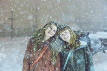 girls in falling snow 