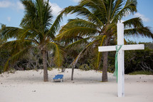 white cross on a beach 