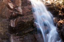 waterfall down a rock cliff 