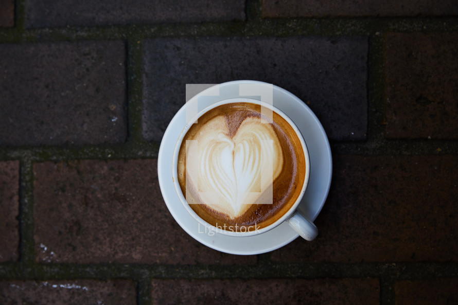 heart shape in creamer in coffee 