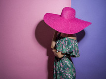 lady in a pink hat 