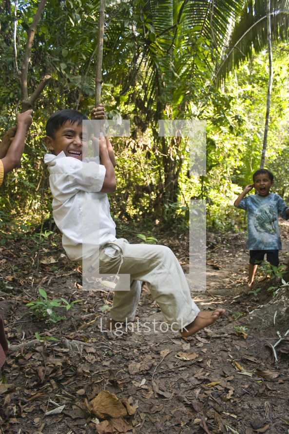 happy kids playing in a jungle 