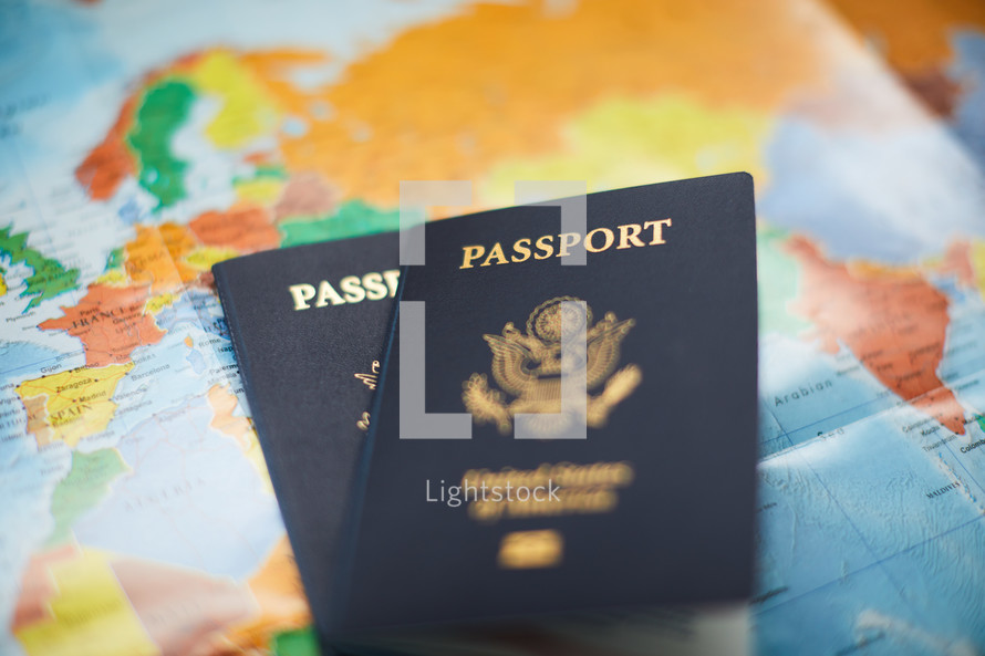  passports on a world map 