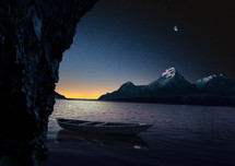 boat floating on still water at night 