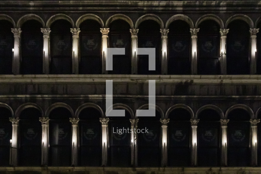 lights shining on columns in Venice 