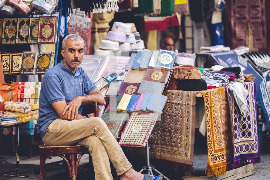 vendor at an outdoor market in Egypt 