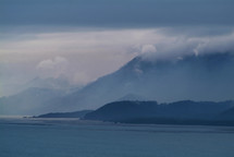 Clouds over coastal mountains