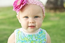 toddler girl in a head band